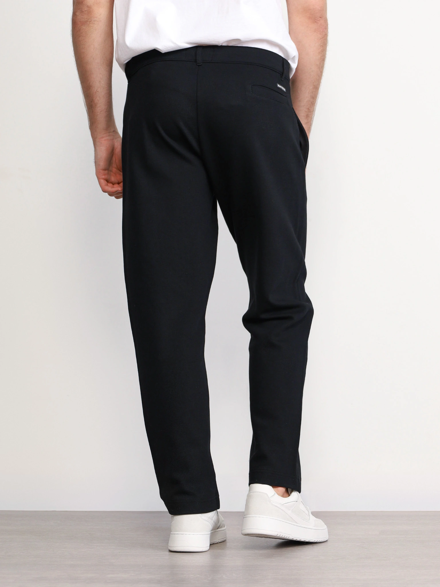 Брюки трикотажные черного цвета из смесового хлопка